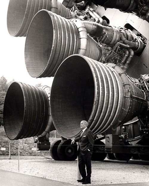 Dr. von Braun stands by the five F-1 engines of the Saturn V.jpg